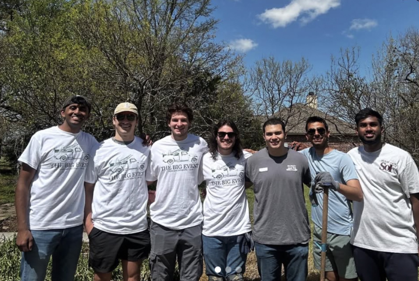 Members in Big Event volunteer shirts outdoors