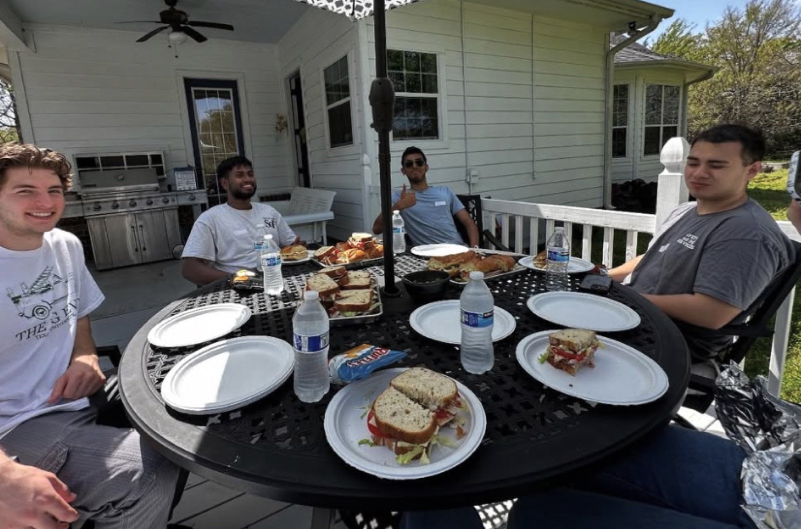 Members eating lunch after volunteering for the Big Event